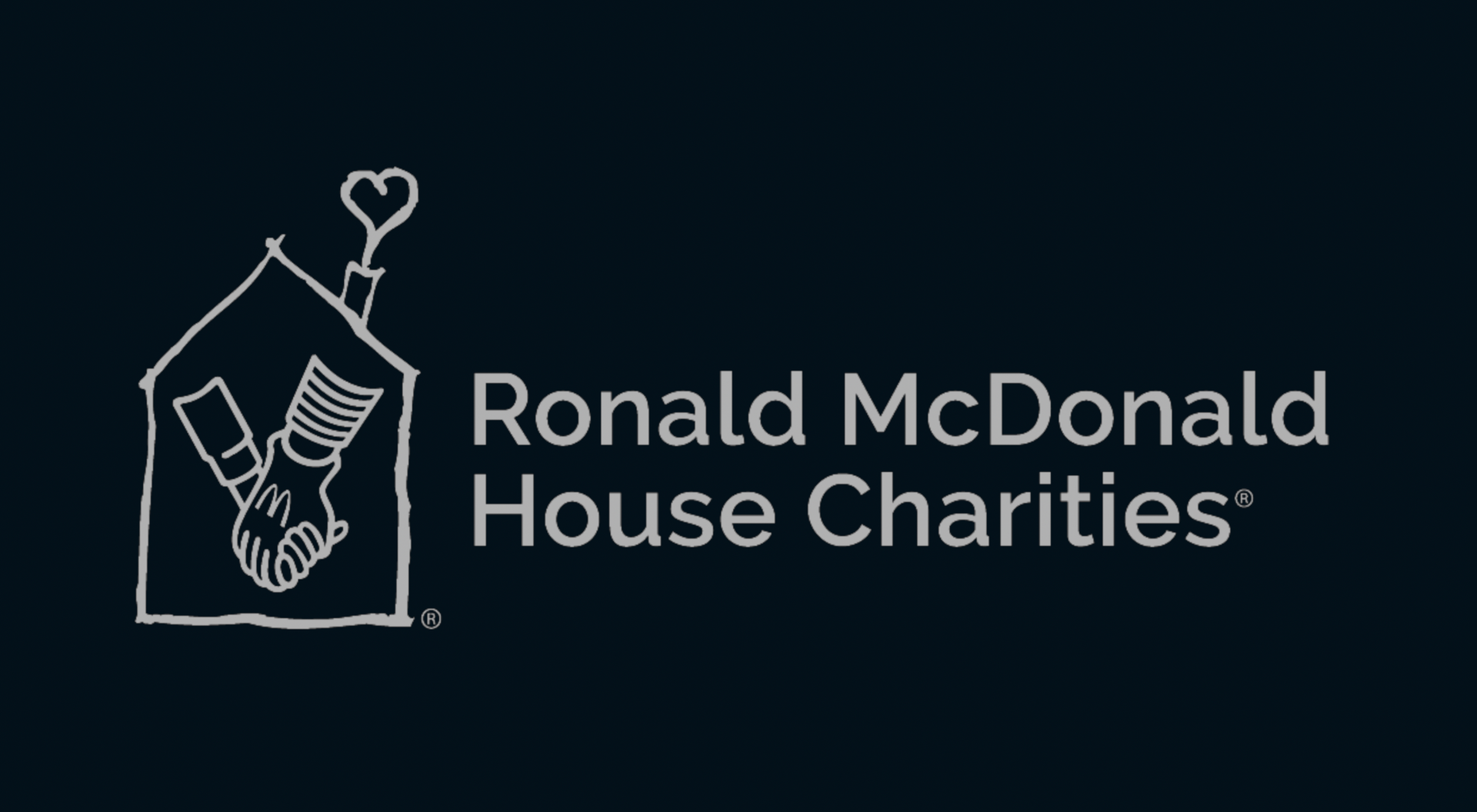 The logo for ronald mcdonald house charities is on a black background.