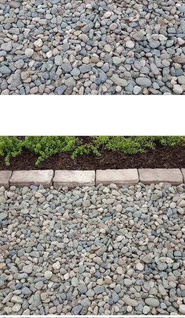 Gravel beds separated by a row of pavers and a narrow strip of mulch with green plants