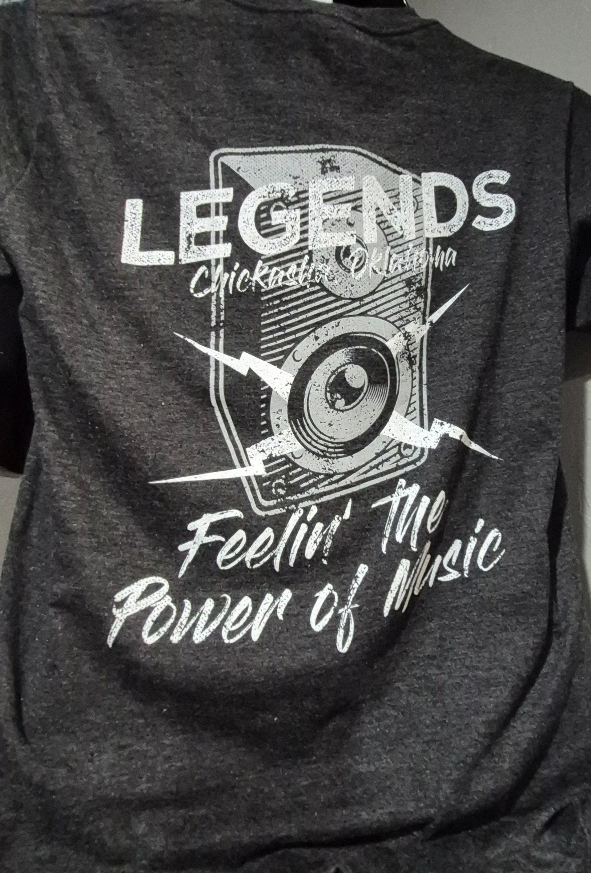 Dark gray T-shirt with “LEGENDS Chicago” and “Feeling the Power of Music” text and graphic