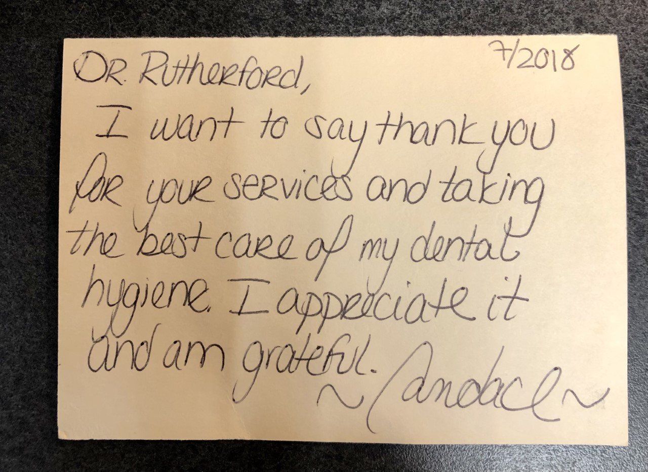 Handwritten thank-you note to Dr. Rutherford for dental care; dated July 2018, signed 