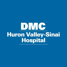 The logo for huron valley sinai hospital is blue and white.