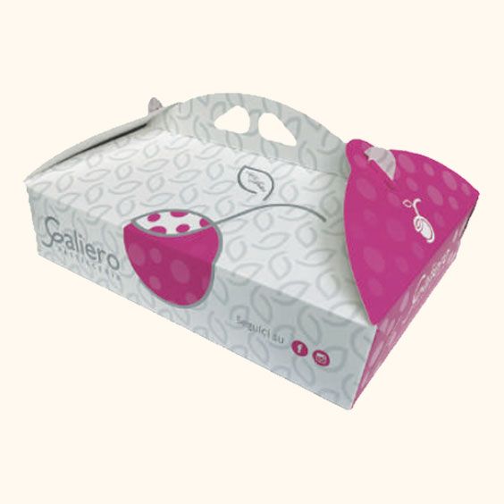 Scatola da asporto bianca con pannelli a pois rosa e aperture per le maniglie