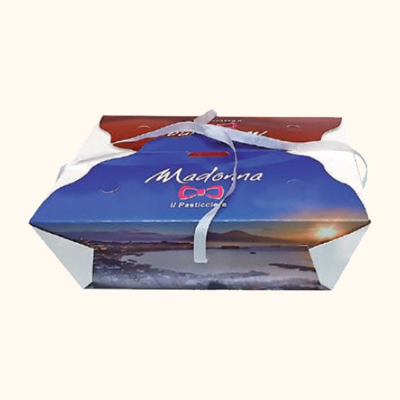 Scatola souvenir blu con nastro bianco e disegno di un tramonto sulla spiaggia, con etichetta