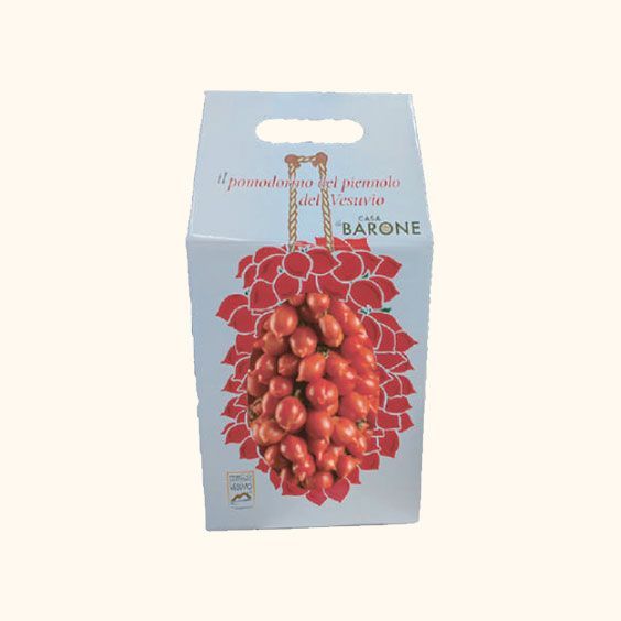 Scatola blu con l'illustrazione di un grappolo d'uva rossa e testo in italiano sul davanti.