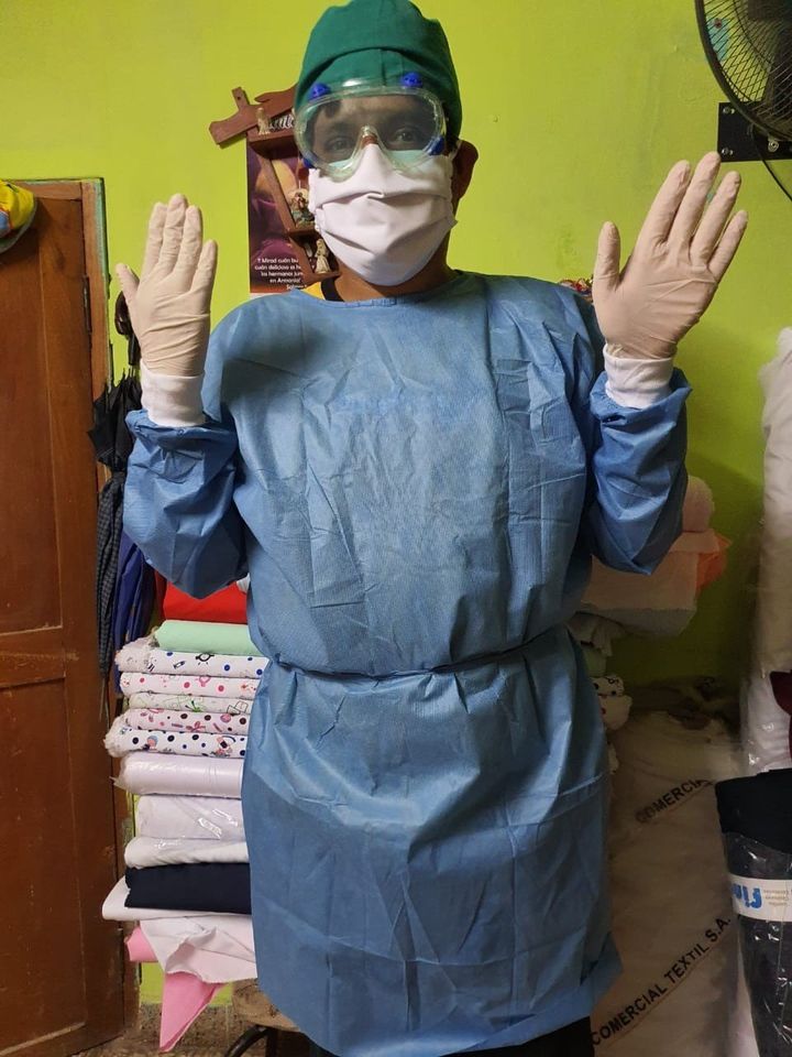 Telas Chano  y  Comercial Villegas, traje de seguridad.