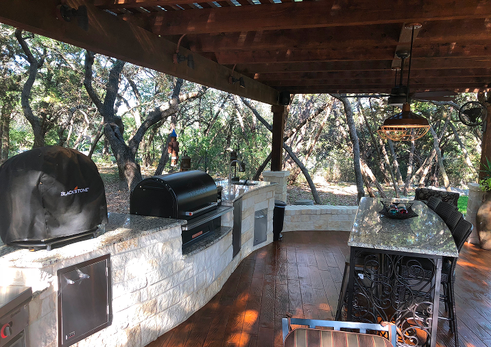 Expertly installed outdoor kitchen with integrated grill and smoker