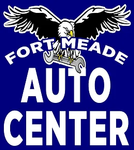 Fort Meade Auto Center logo: eagle with outstretched wings over wrench, text on blue background | Fort Meade Auto Center