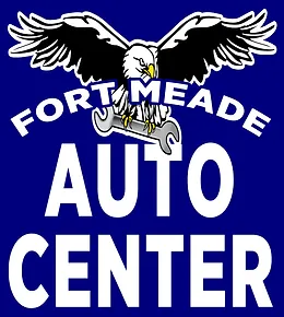 Fort Meade Auto Center logo: eagle with outstretched wings over wrench, text on blue background | Fort Meade Auto Center