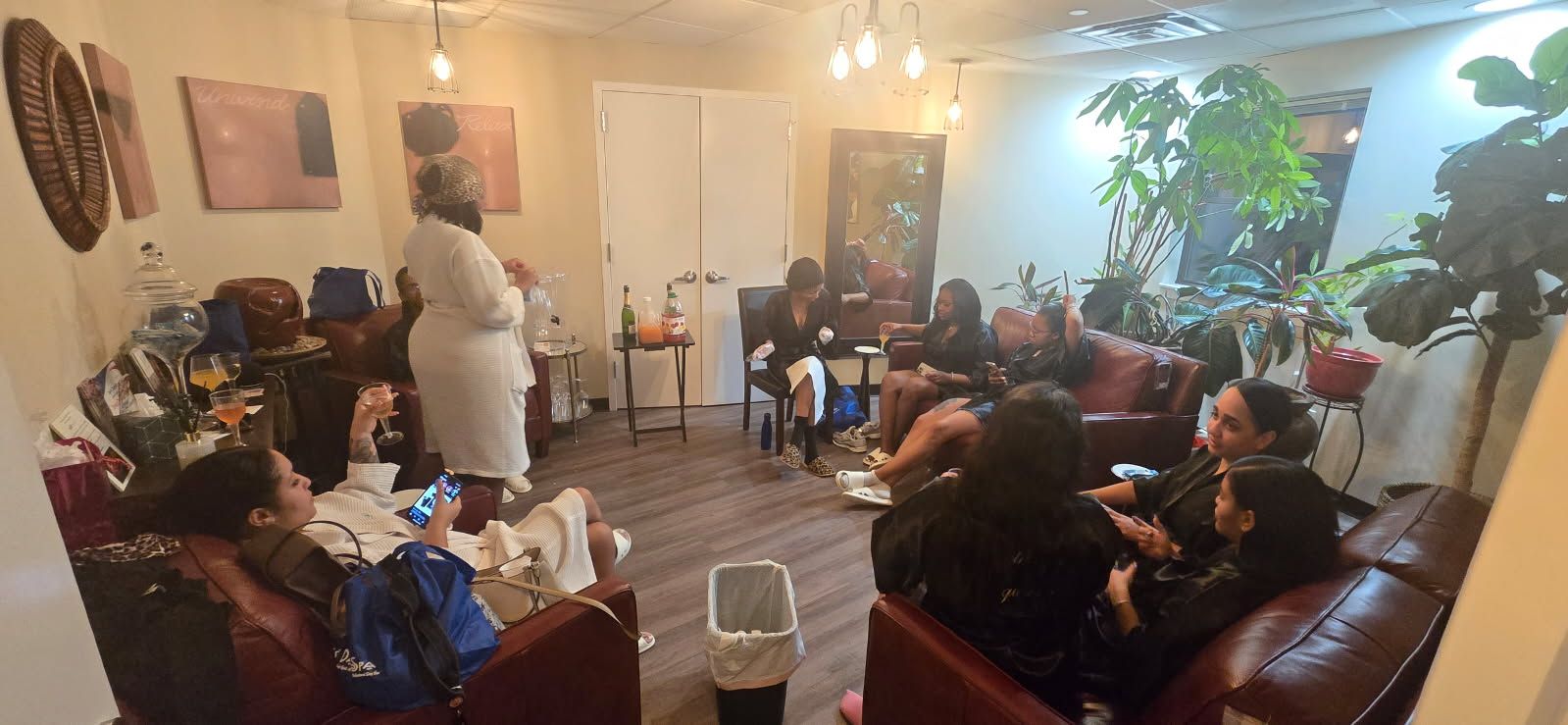 A group of people are at a spa having a spa party.