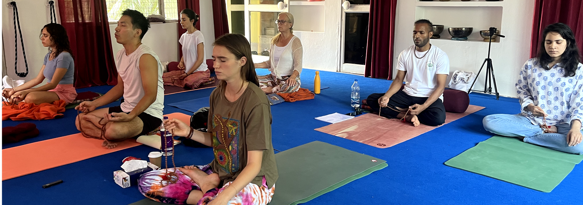 Om Chanting in a group at Yoganga Healing Rishikesh as part of Pranayama Teacher Training Course