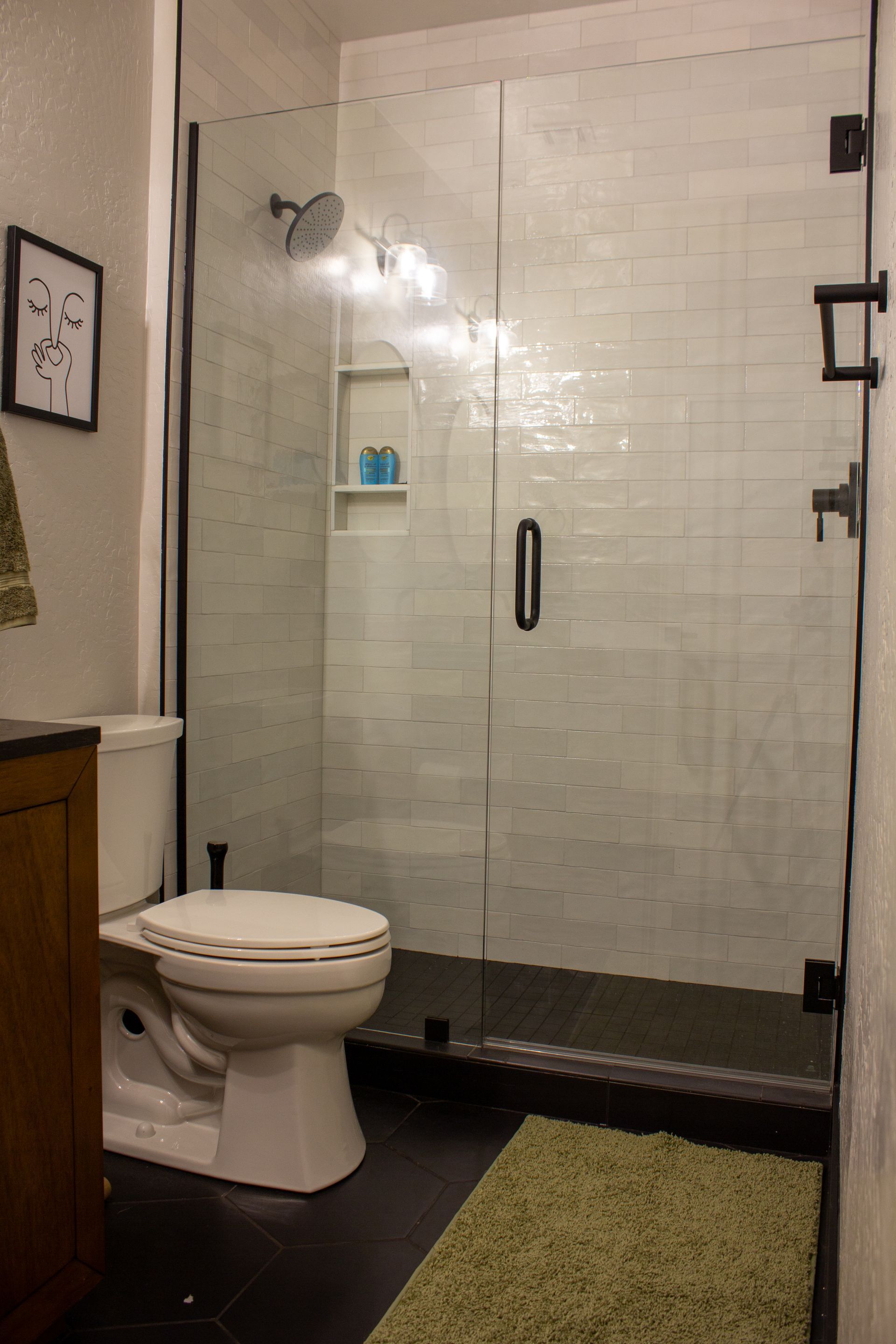 Modern bathroom with a walk-in shower, freestanding tub, and terrazzo floor.