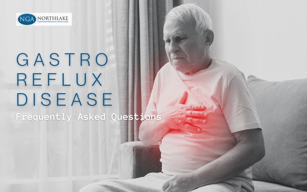 man with GERD clutching chest
