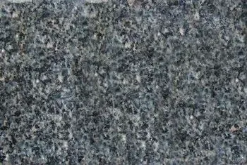 Close-up of a gray speckled stone or granite surface