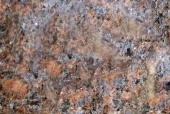 Close-up of speckled pink, gray, and black granite surface