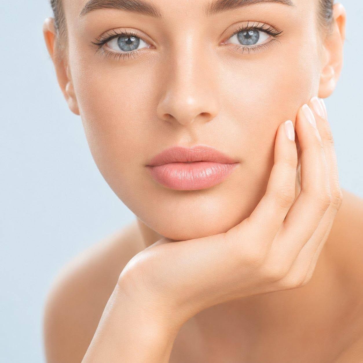Close-up portrait highlighting natural lip enhancement with dermal fillers in Newmarket