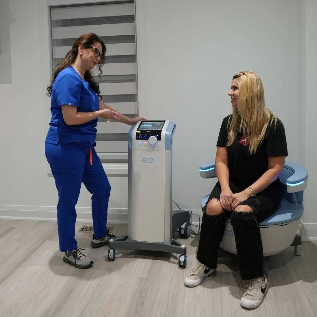 Pelvic floor therapy consultation at N.H.F Clinics in Newmarket, using a HIFEM treatment chair