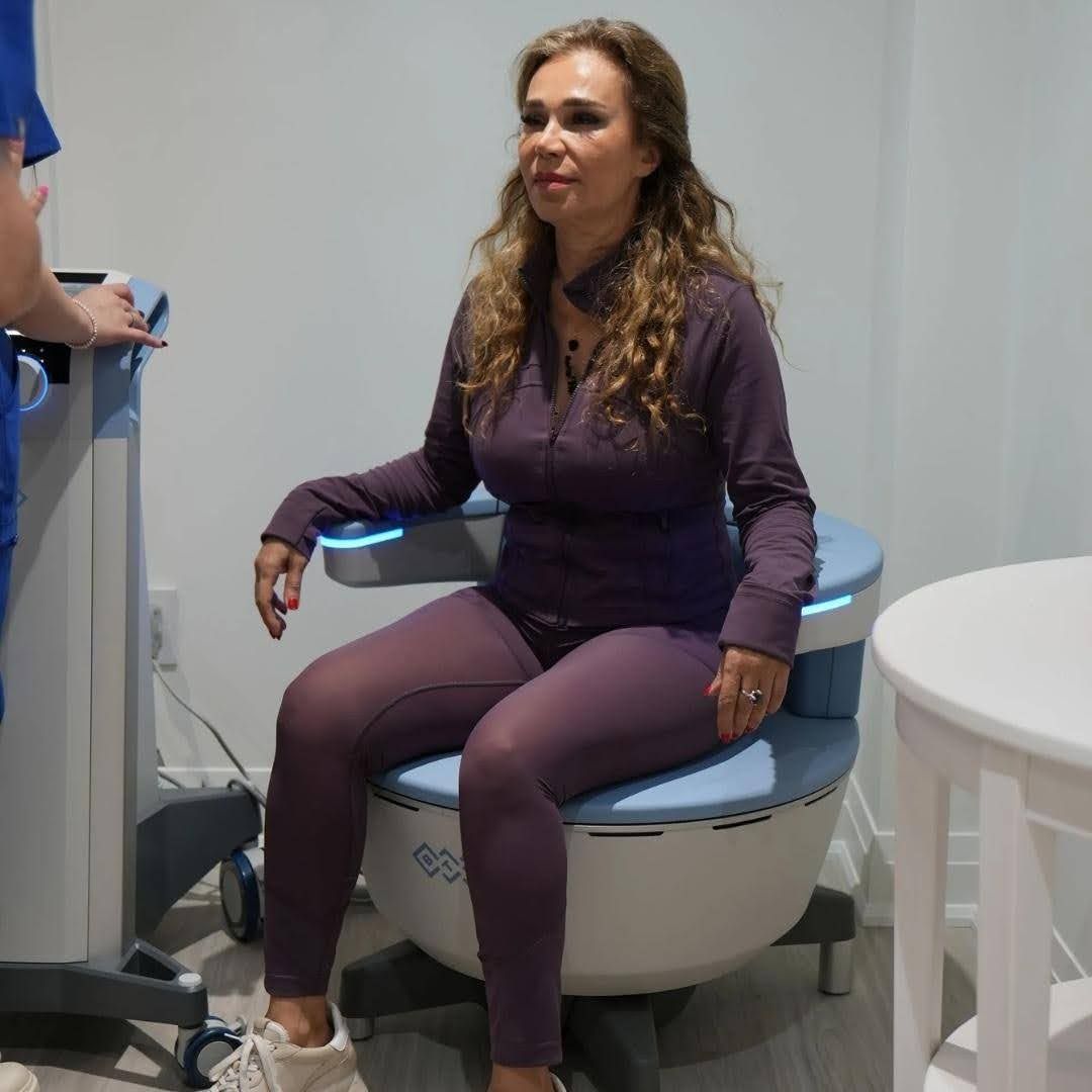 Client receiving non-invasive pelvic floor therapy on a HIFEM chair at N.H.F Clinics in Newmarket