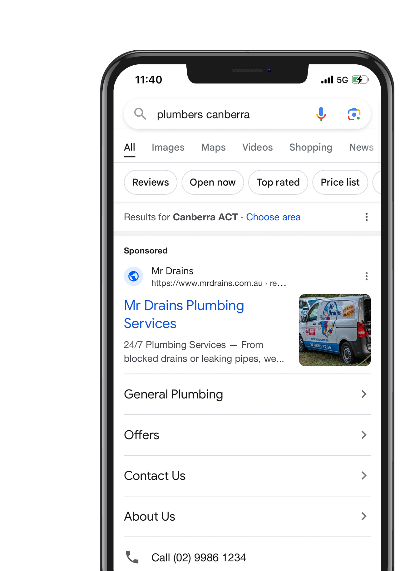 A cell phone is open to a google search page.