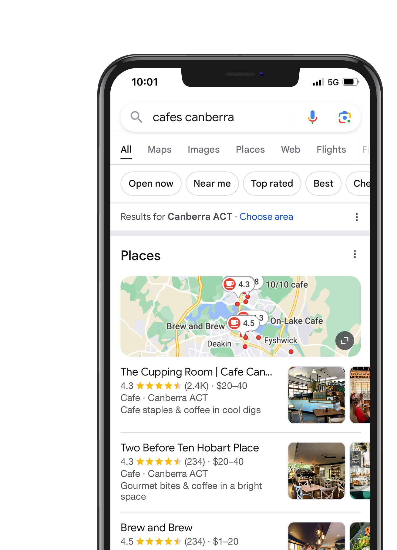 A cell phone is open to a google search page.