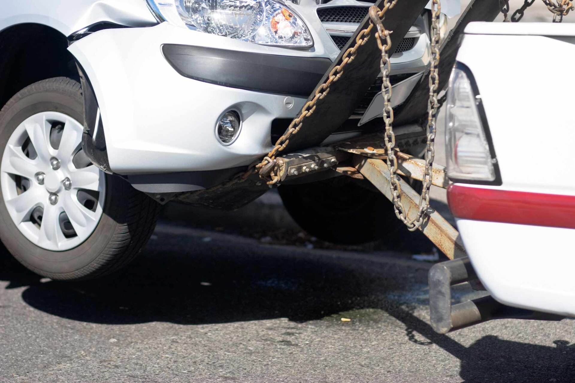 White car getting towed — Gary, IN — Macer Transportation White car getting towed — Gary, IN — Macer Transportation
