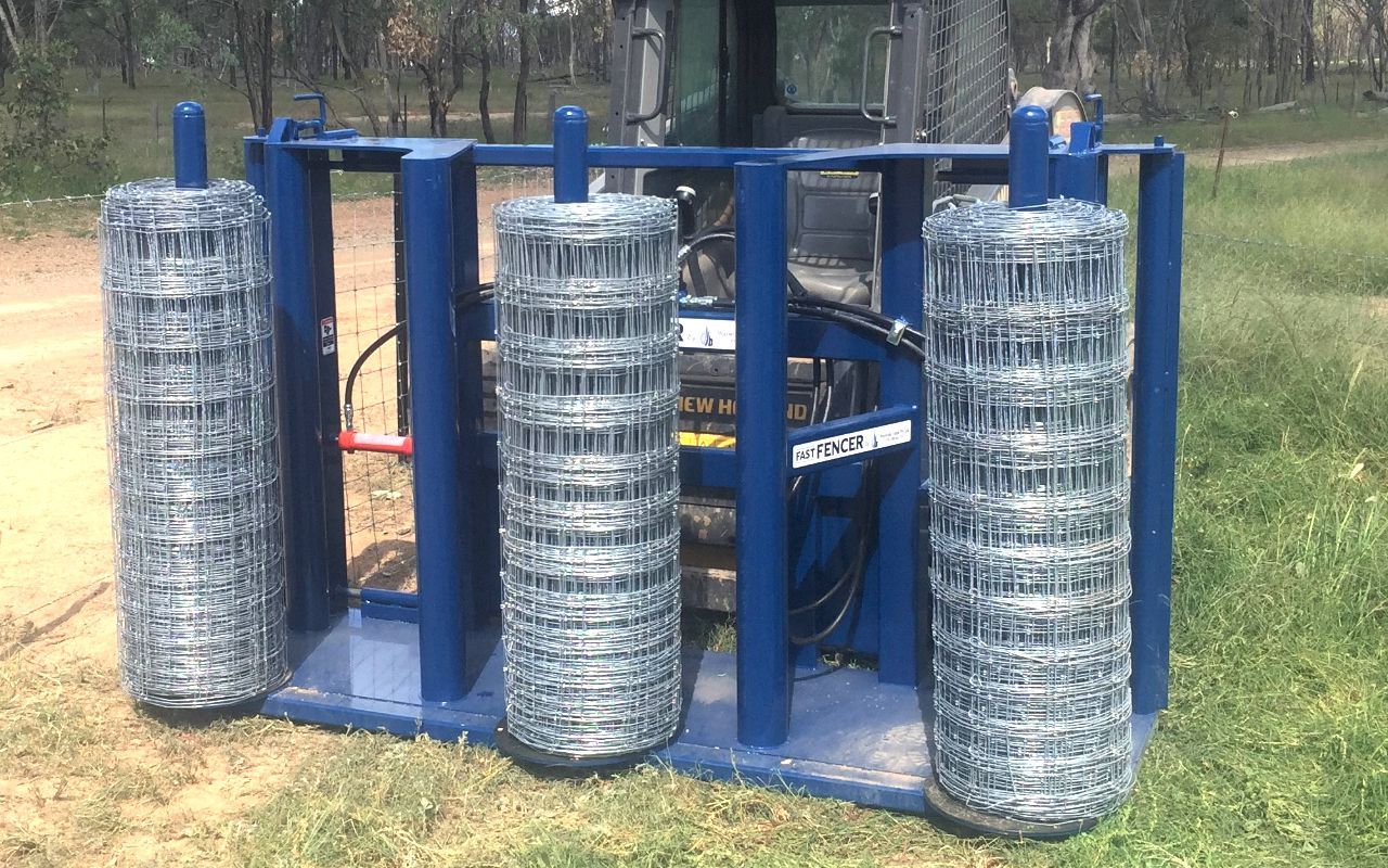 Rural fencing machine, carries 3 rolls of ringlock and fence mesh rolls