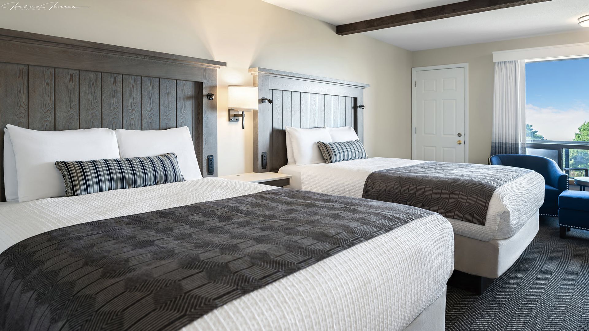 Hotel Room with Two Beds and A Chair
