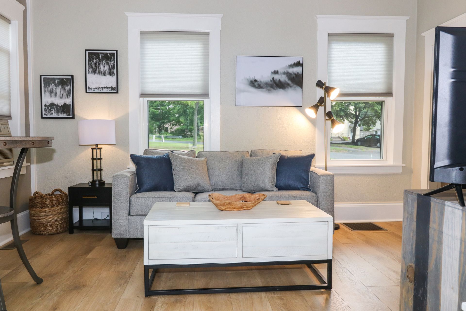 A living room with a couch and a coffee table