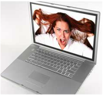 women pulling hair on laptop A laptop computer with a picture of a woman on the screen.