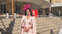 Emma Rego in a pink floral outfit and fuchsia hat on the steps at Buckingham Palace, REGO Creative journal