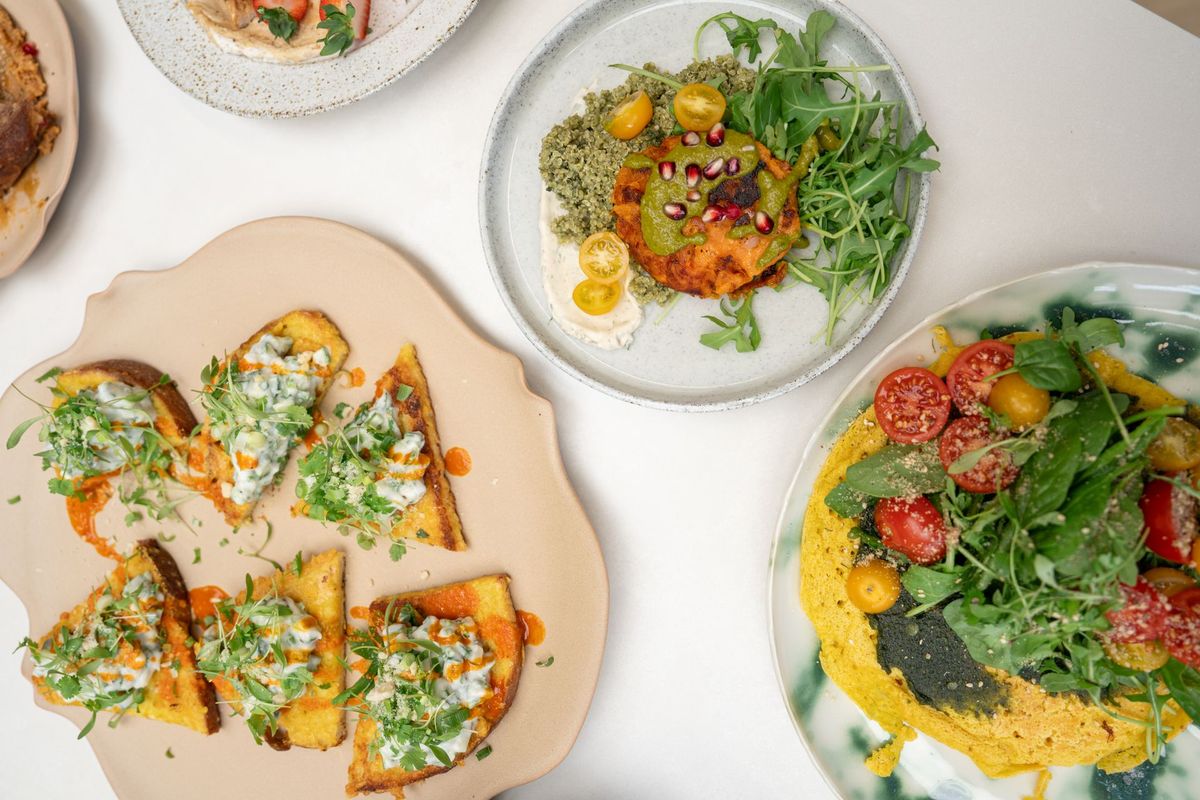 Retreat Chef Academy dishes: tahini toasts with herbs, a sweet potato cake with quinoa and pomegranate, and a chickpea pancake with tomatoes and greens, Bettina’s Kitchen by REGO Creative