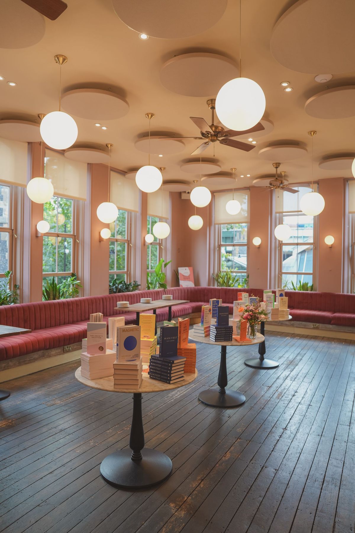 Book tables set up at the Mallow London venue for the Coral Press launch, by REGO Creative