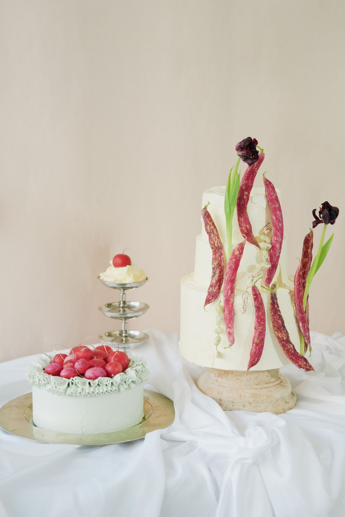 Nuun Cakes London bespoke cakes decorated with radishes and heritage beans, by REGO Creative