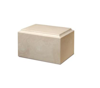 a white marble urn is sitting on a white surface .