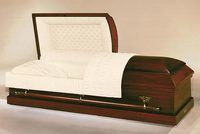 dark wood casket with the lid open