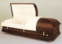 dark wood casket with the lid open