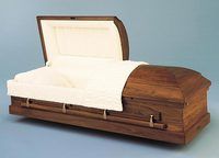 a wooden casket with the lid open