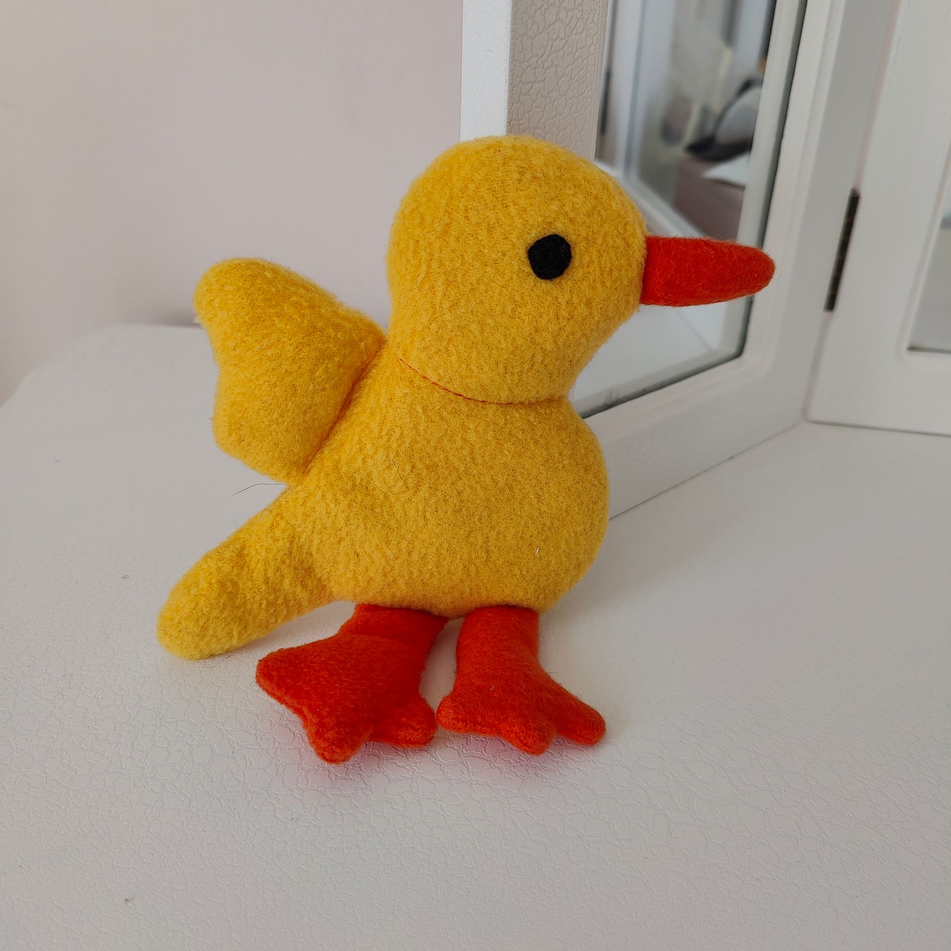 felt chick with yellow body orange beck and legs