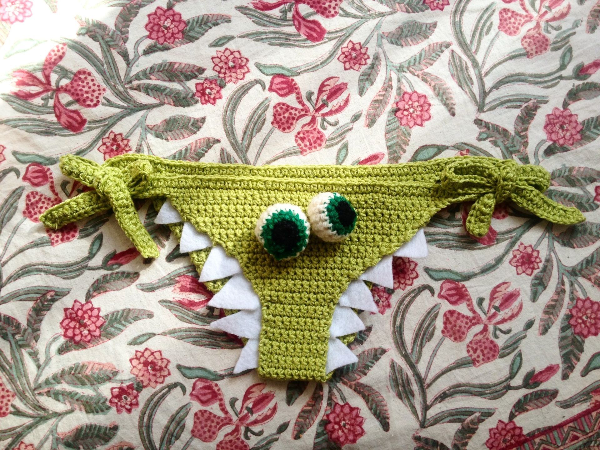 crochet crocodile bikini bottoms with crochet eyeballs and felt teeth