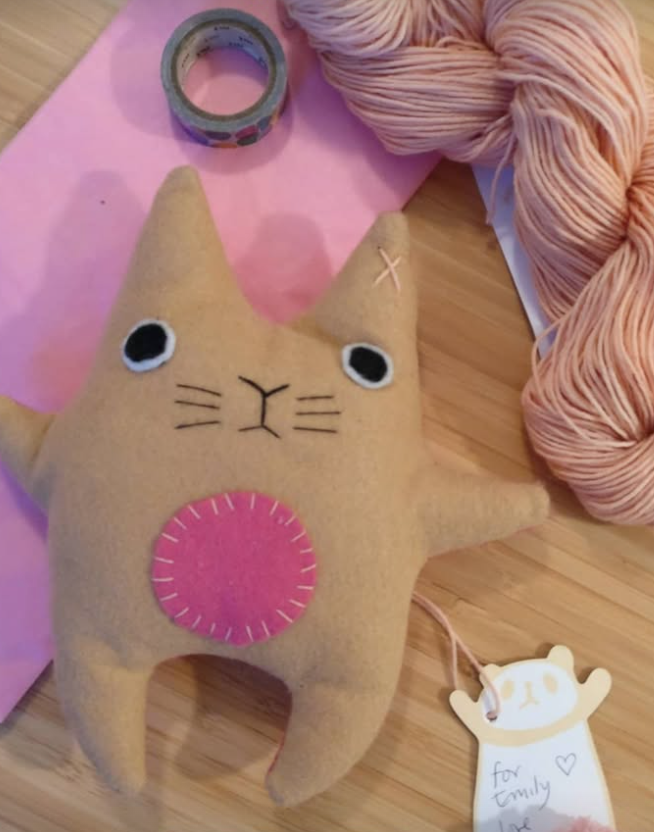 felt creature next wo pink paper and wool