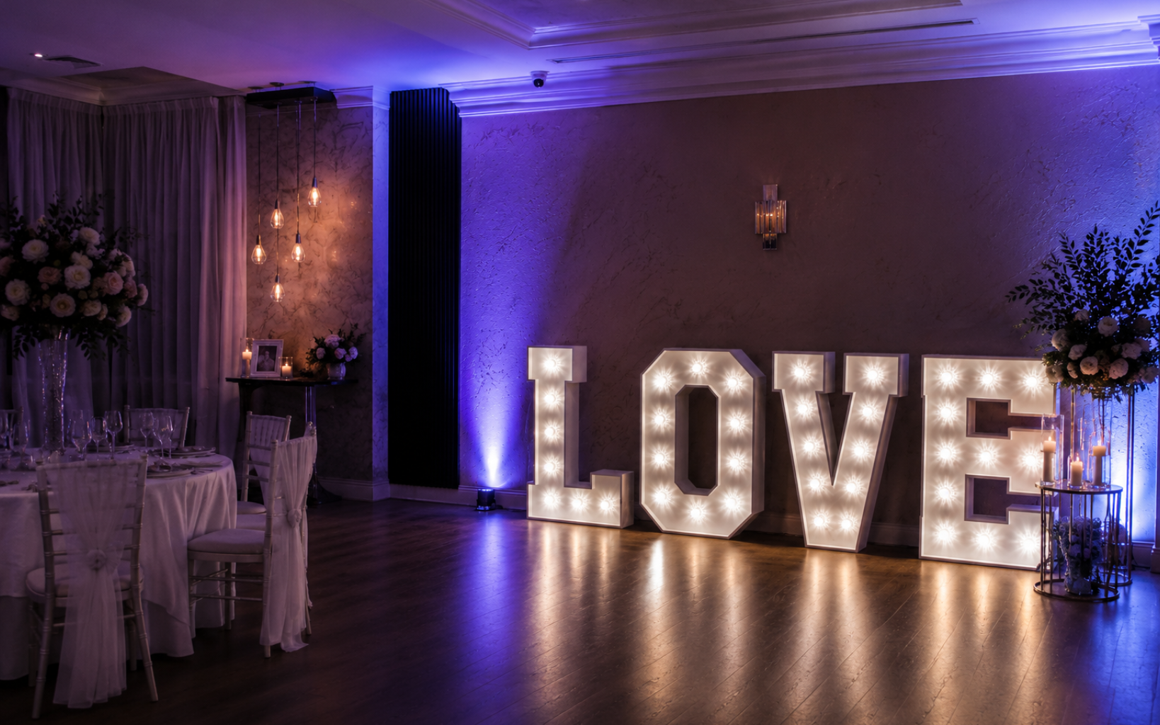 Illuminated LOVE letters at a Cork wedding