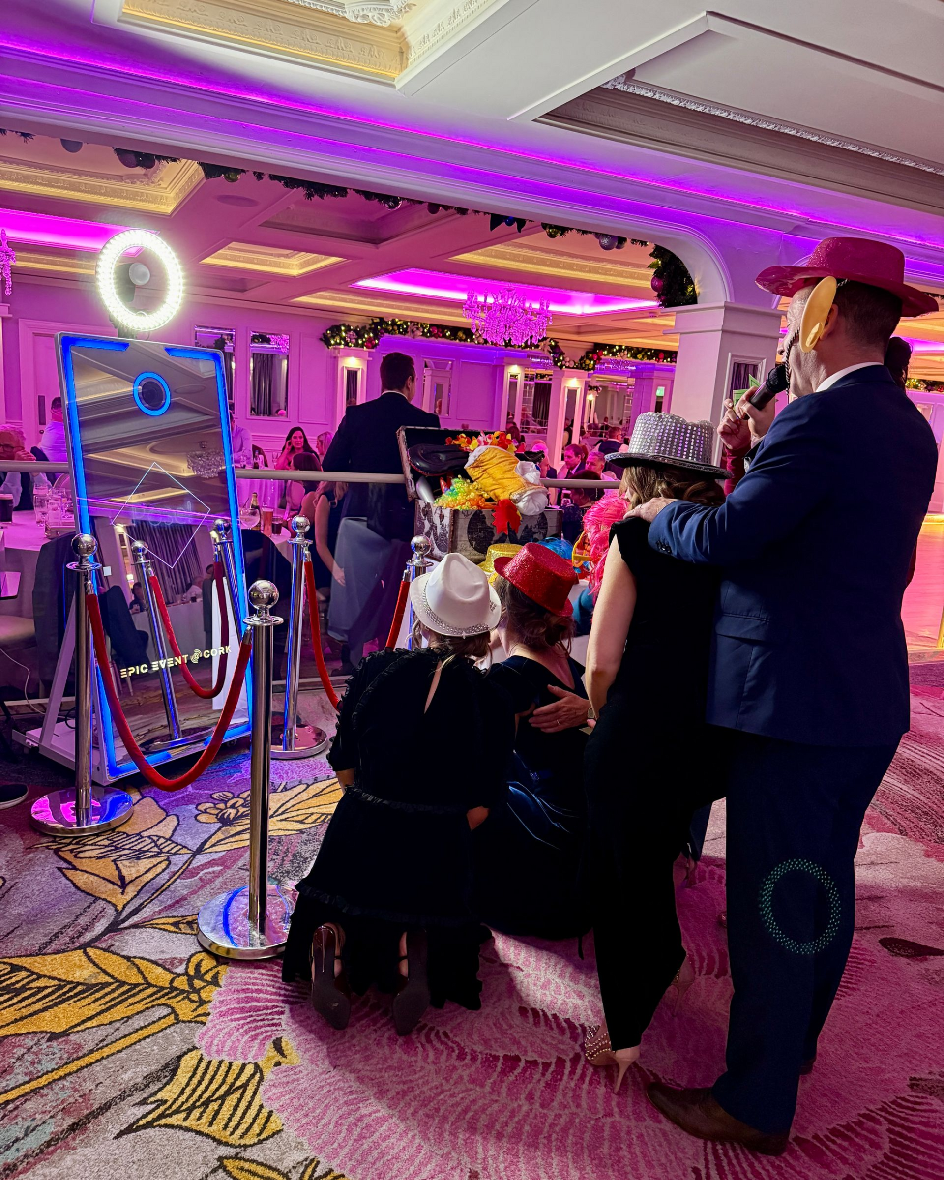 Guests using a selfie mirror photo booth in Cork