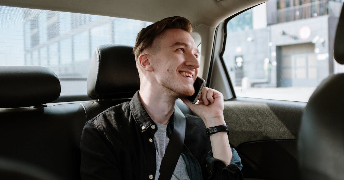 Man on phone in taxi