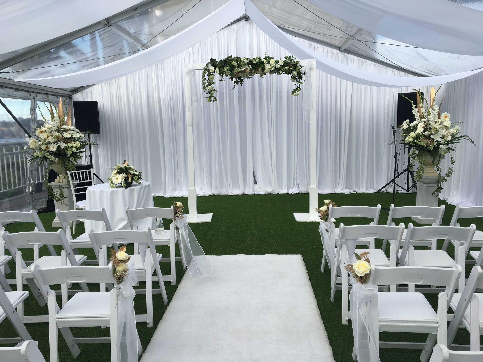 Arch Flowers and White Chairs — Sydney, NSW — Affordable Chair Covers & Candelabras