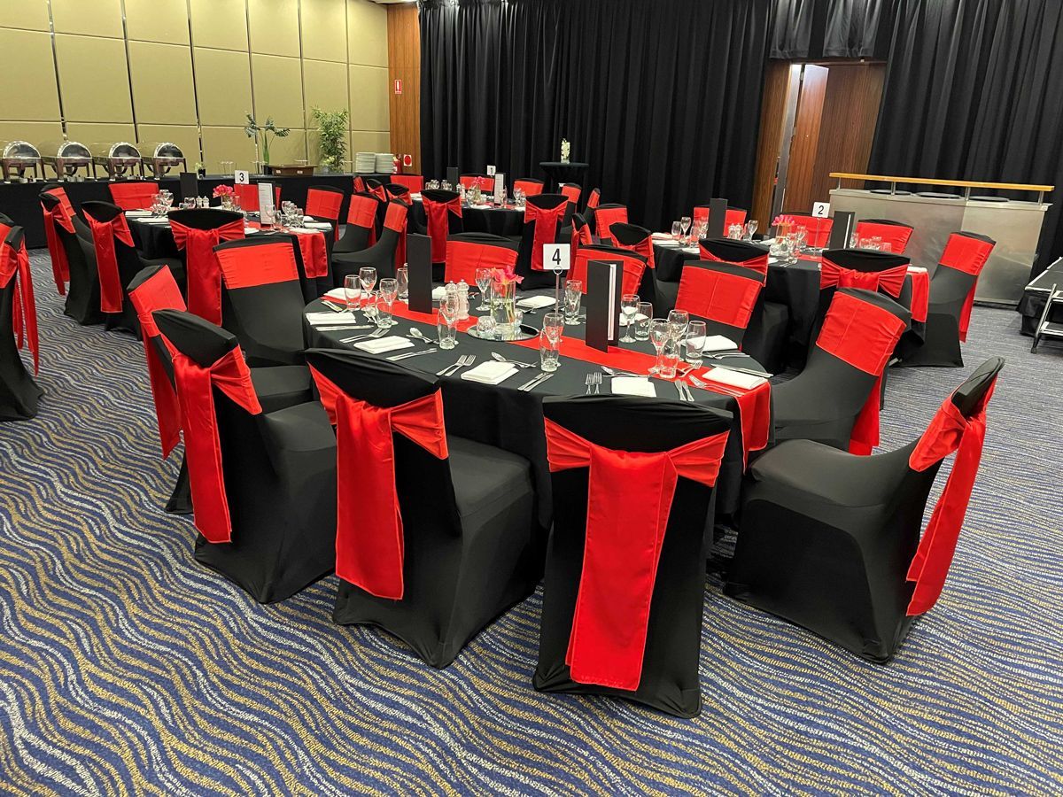 Black and Red Lycra Chaircovers — Sydney, NSW — Affordable Chair Covers & Candelabras