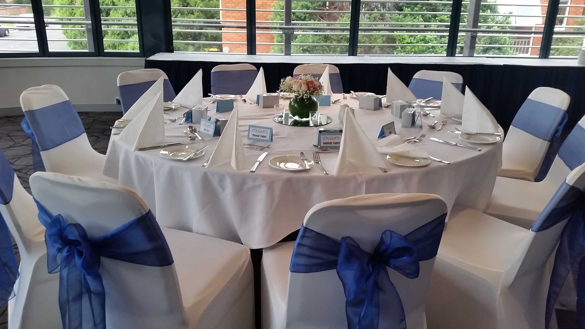 Blue Tie Back Covers — Sydney, NSW — Affordable Chair Covers & Candelabras