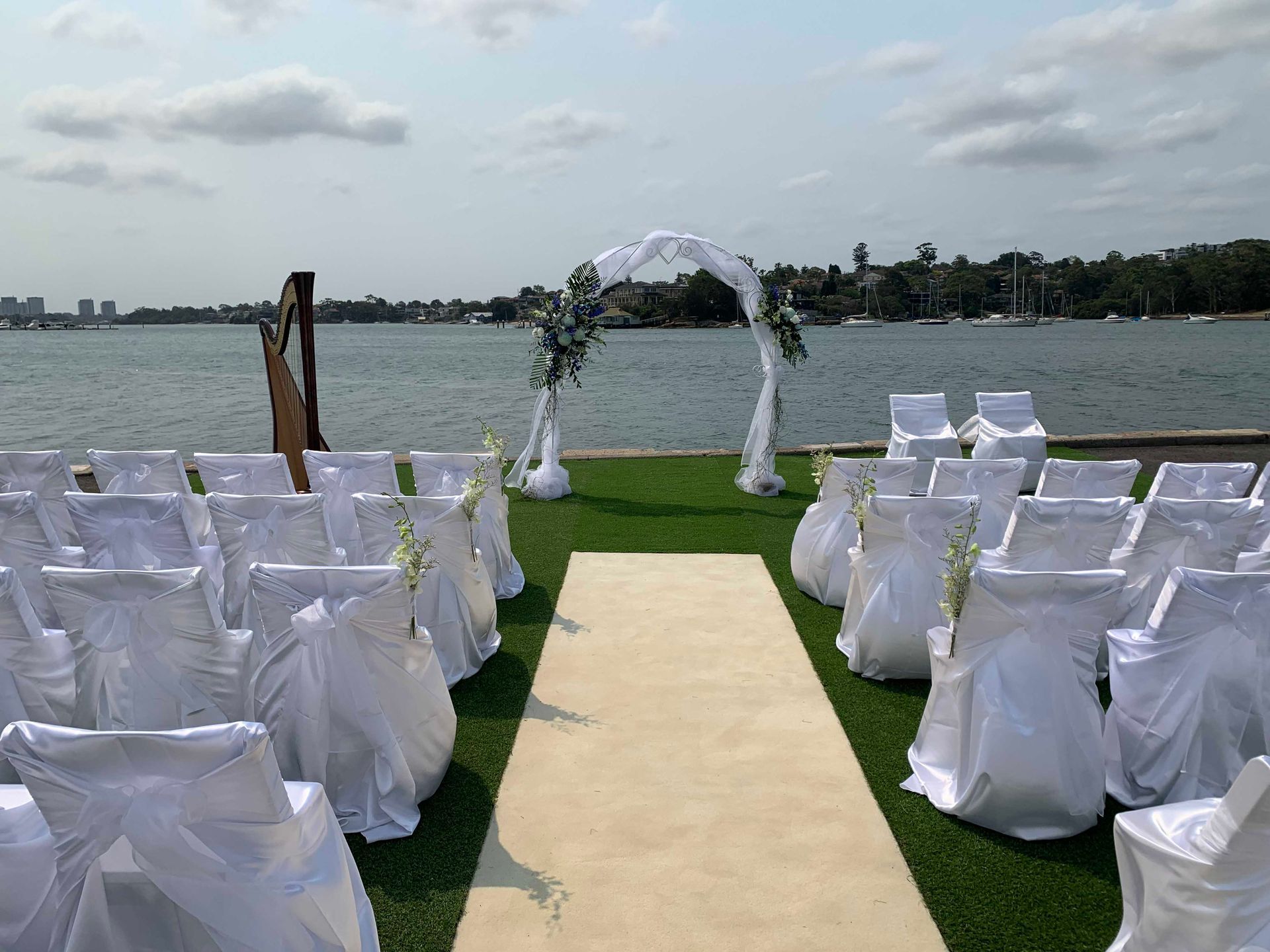 Outdoor Wedding with Tie Back Chairs — Sydney, NSW — Affordable Chair Covers & Candelabras