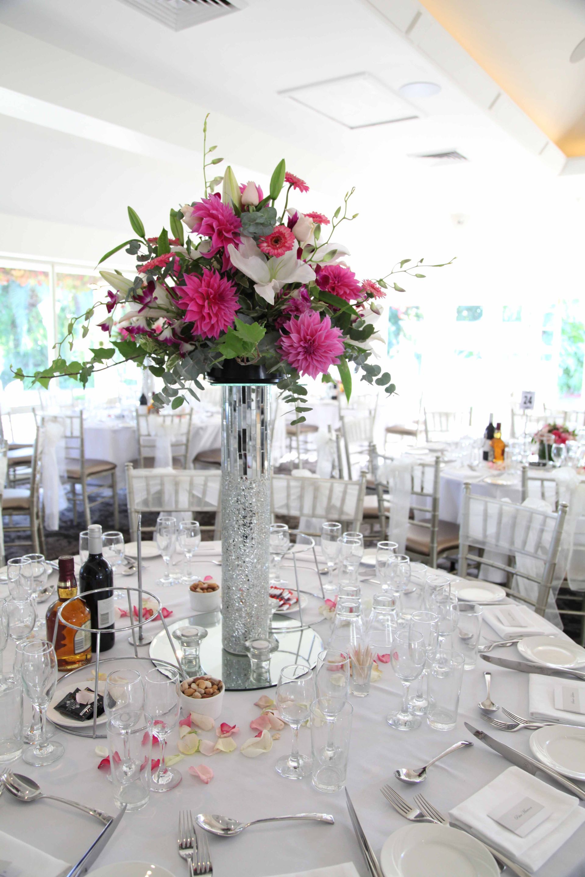 Vase and Glassware on Table — Sydney, NSW — Affordable Chair Covers & Candelabras