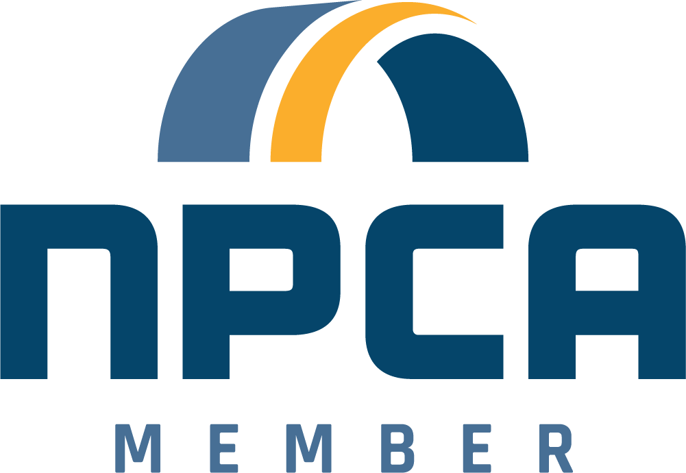 NPCA member logo in blue and gold with arched stripes above the text