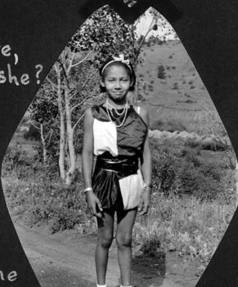 A black and white photo of a girl with the words 