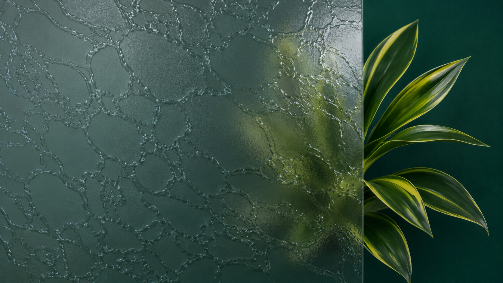 Green textured abstract background with a leafy plant on the right edge